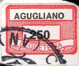Marca da Bollo del Comune di AGUGLIANO su Carta Bianca di dimensioni 19 x 13,5 mm