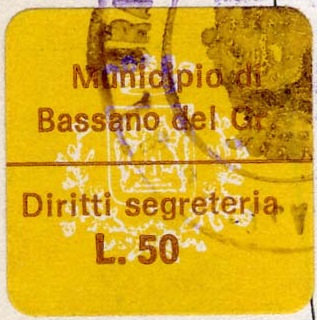 Marca da Bollo del Comune di BASSANO DEL GRAPPA su Carta Colorata di dimensioni 21 X 14 mm