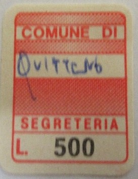 Marca da Bollo del Comune di QUITTENGO su Carta Bianca di dimensioni 15,5 x 20 mm