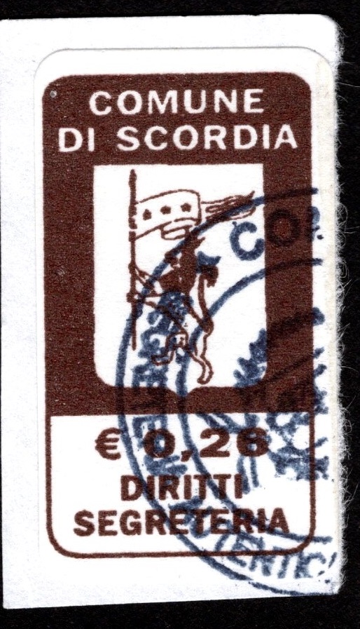 Marca da Bollo del Comune di SCORDIA su Carta Bianca di dimensioni 18 x 31 mm