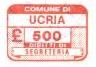 Marca da Bollo del Comune di UCRIA su Carta Bianca di dimensioni 19,5 x 13,5 mm